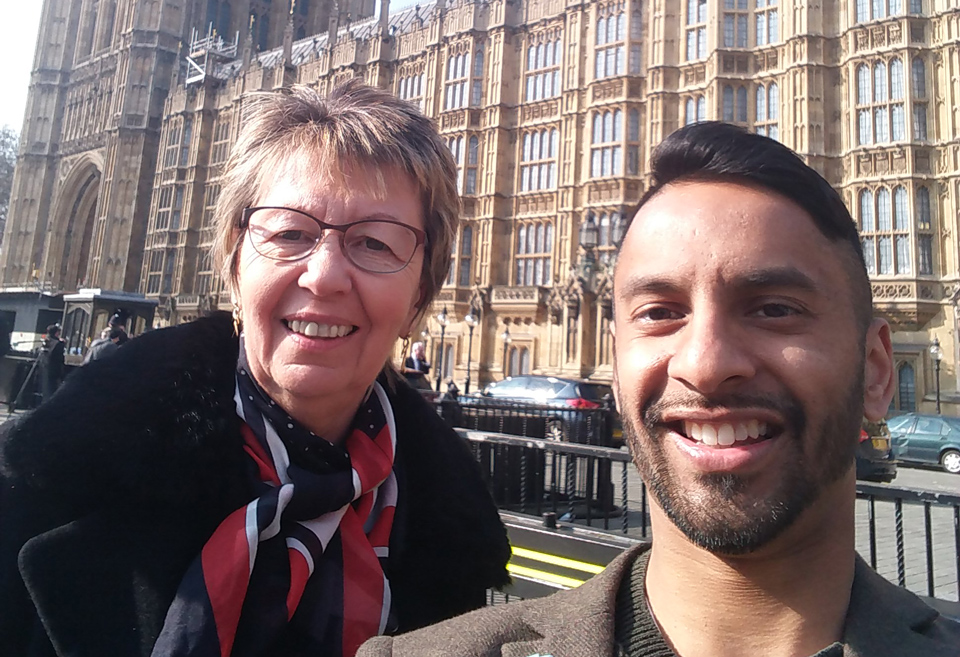 Julie Taplin, CEO of Potential Plus UK, with Bobby Seagull, outside the Houses of Parliament