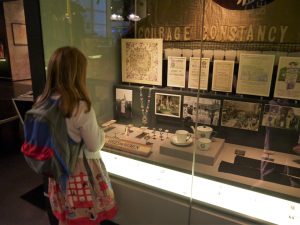 Gir standing in front of the Museum of London Suffragette Exhibit