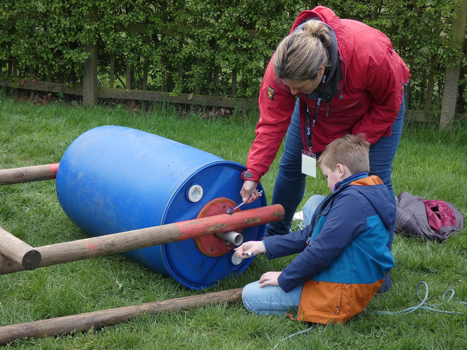 Mother and child creating a rolling racing buggy at the PPUK Be Curious Weekend 2019