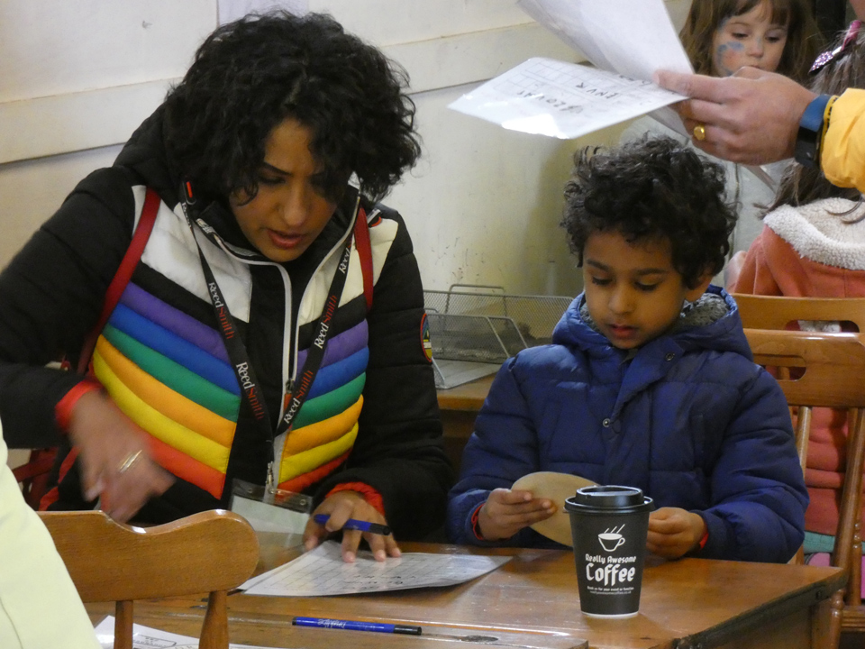 Mother and child sharing an activity at the PPUK Be Curious Weekend, 2019