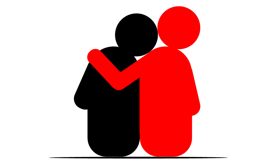 Two figures sitting next to each other in an empathetic hug