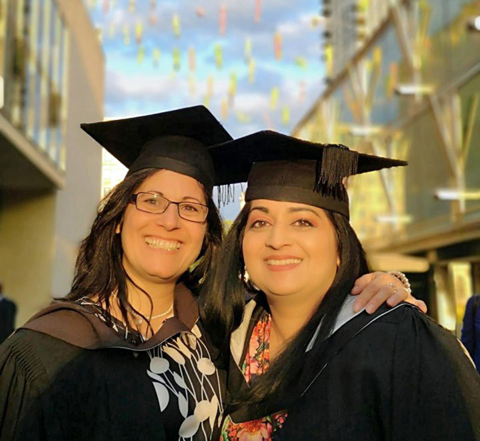 Andrea Anguera and Radhika Rajbans at their masters graduation ceremony from UCL, July 2019
