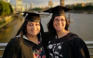 Radhika Rajbans and Andrea Anguera outside near the Thames following their masters graduation ceremony from UCL, July 2019