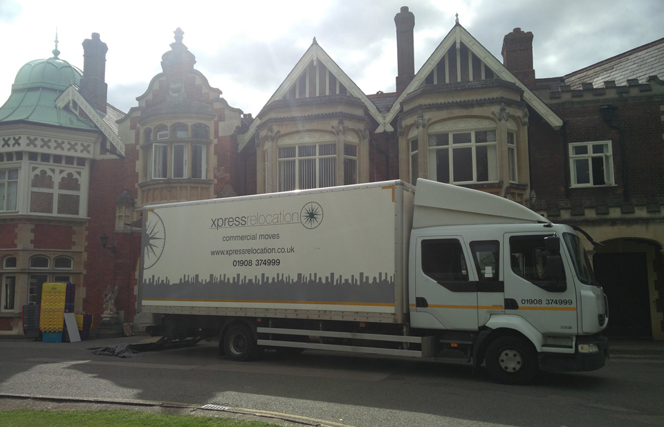 Moving van parked outside of The Mansion Bletchley Park