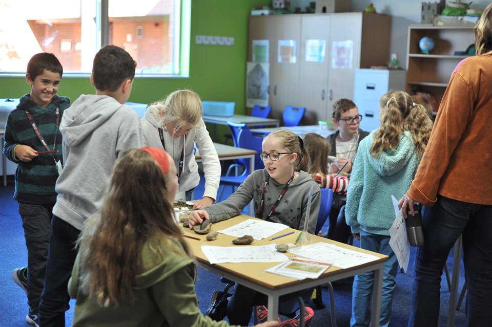 Group of children working at a table at the Big Family Weekend 2018