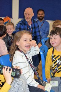 girl delighted by fun with words session with Paul Cookson Potential Plus UK's BIG Family Weekend, 2019