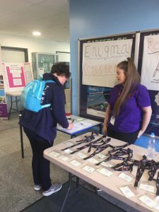 Holly from Potential Plus UK manning the signing in desk Potential Plus UK's BIG Family Weekend, 2019