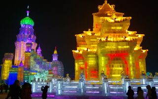 Ice sculture of an oriental palace lit up with festive colours