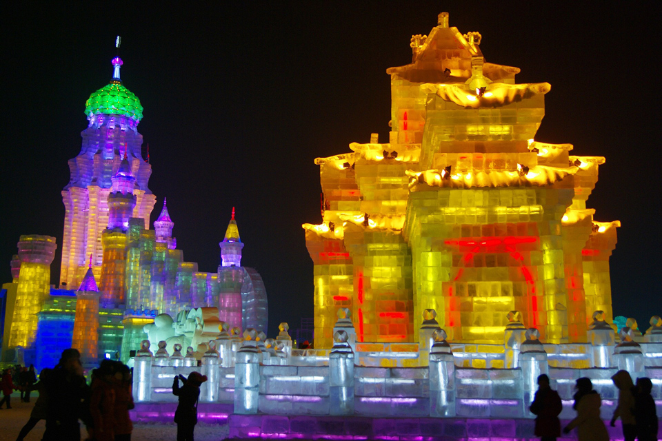 Ice sculture of an oriental palace lit up with festive colours