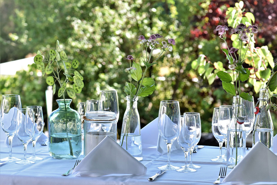 Outdoor table set with glasses for a party