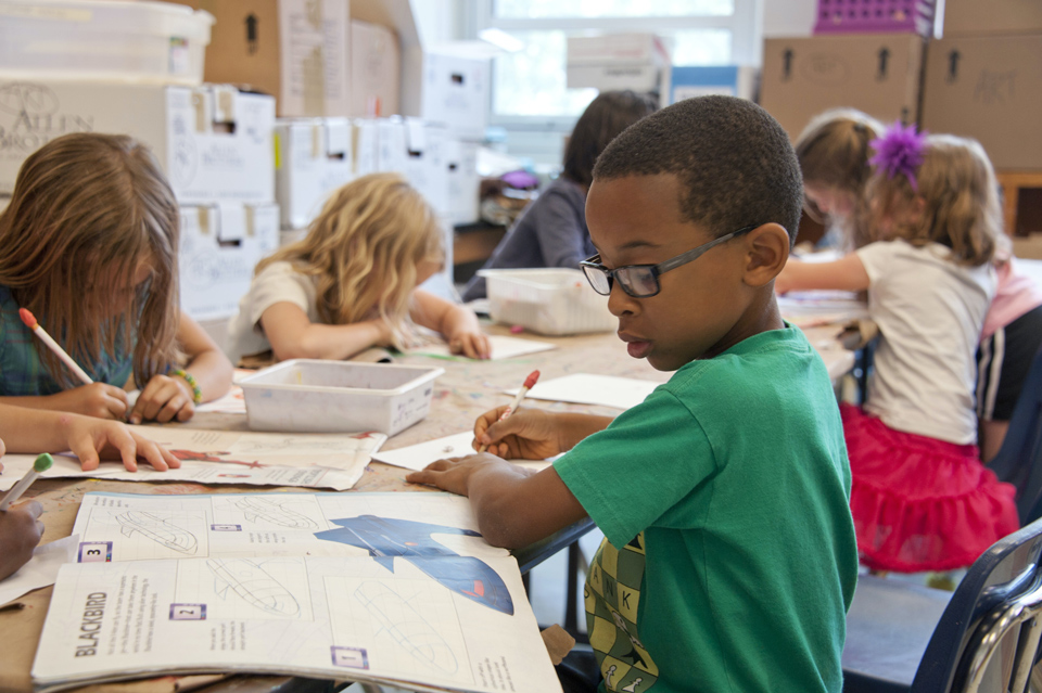 Photo of a classroom showing children hard at work