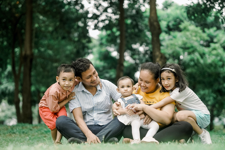 Photo of a happy family enjoying the outdoors