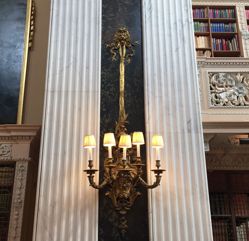 Wall lights surrounded by pillars