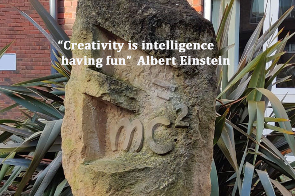 sculpture E=MC2 on Open University MK campus, Words say Creativity is intelligence having fun - Albert Einstein