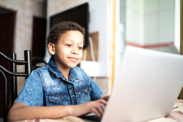 boy working on a laptop