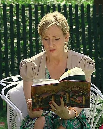 J.K. Rowling reading a Harry Potter book