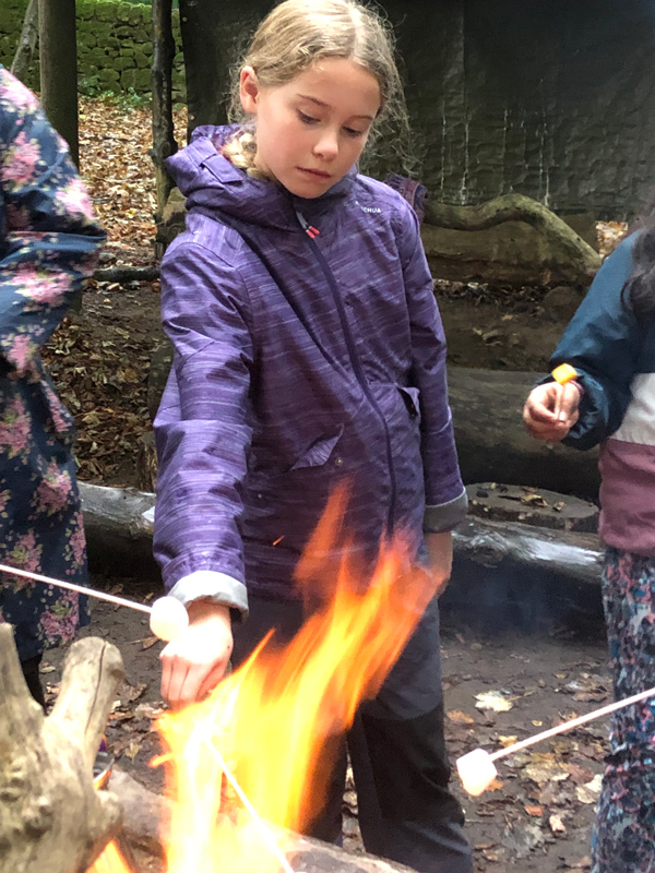 Toasting marshmallows at Lea Green Centre, Let's Explore Day, October 2021