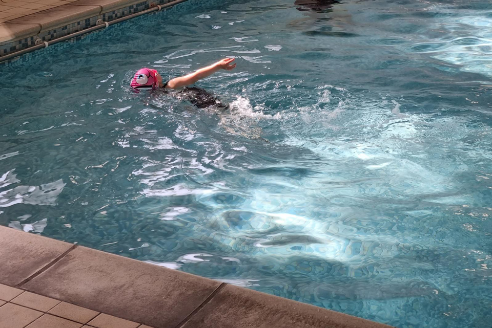 young girl swimming