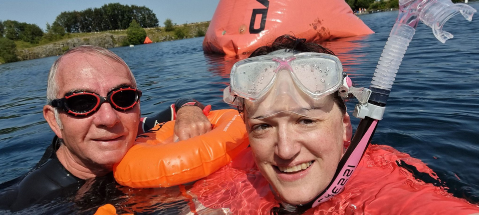 Amanda and brother-in-law open water swimming in a quarry