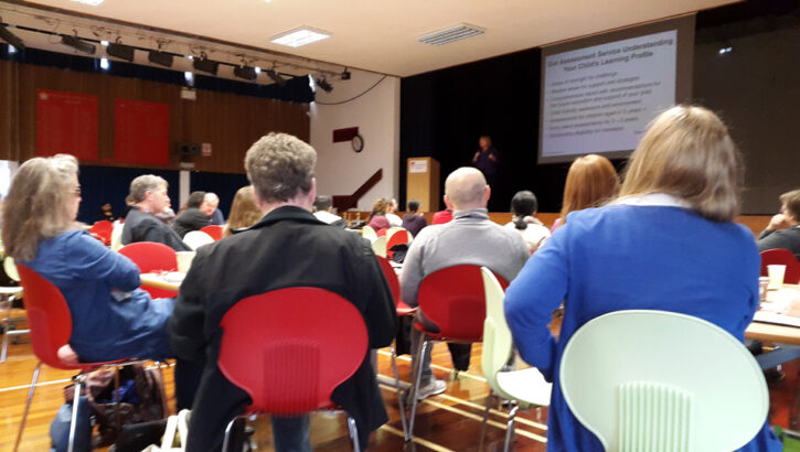 group of people sitting in a seminar