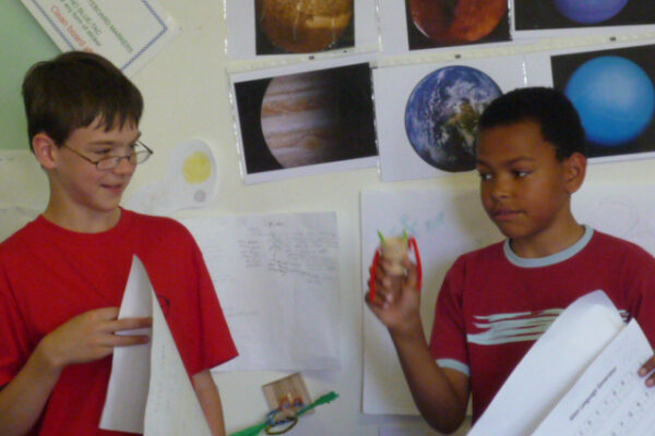 boys presenting on a space theme