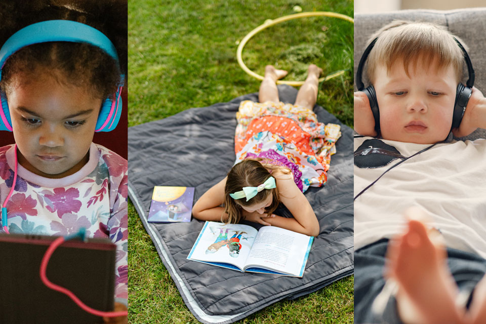 children watching tablet, reading, listening through headphones